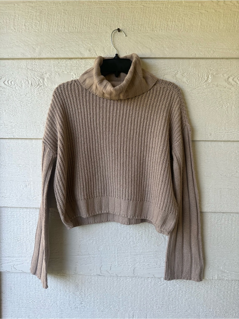 Beige cropped turtleneck sweater